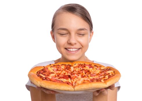 Happy beautiful teen girl holds plate with fresh pizza, isolated on white background