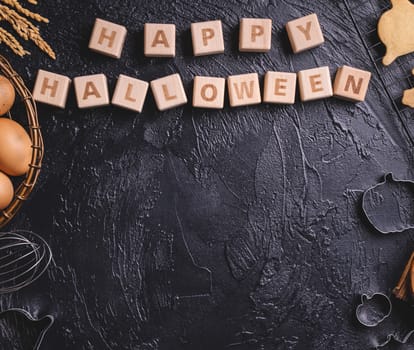 Design concept of top view layout of making Halloween cookies, preparing party, overhead, blank copy space.