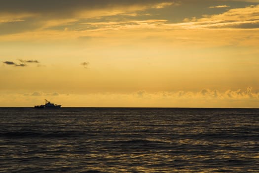 Seascape of the sunset on the Black sea, sunset time and colors, multicolored, orange,red,yellow,blue and purple,shadows and light.