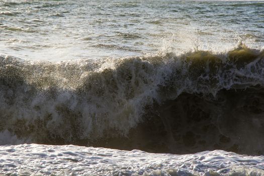 Sea and waves, stormy weather, waves and splashes in Batumi, Georgia. Stormy Black sea. Water background.