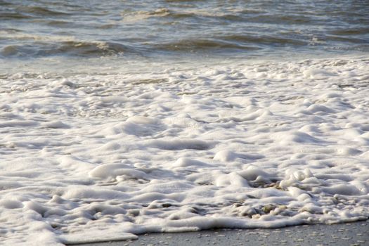 Stormy weather, waves and splashes in Batumi, Georgia. Stormy Black sea. Water background.