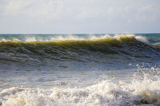 Stormy weather, waves and splashes in Batumi, Georgia. Stormy Black sea. Water background.