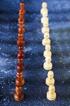 Checkmate and chess Pawn figures close-up, boardgame