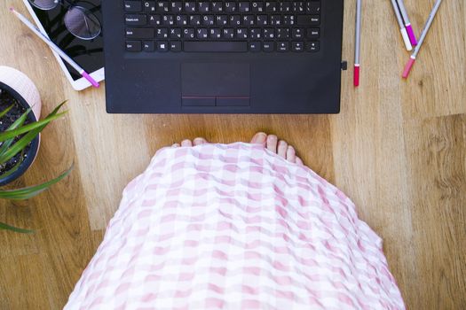 Woman working from home office, notebook or laptop, pencil and other things. Business working process, desktop and keyboard. high angle view..