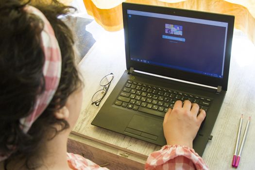 Woman working from home office, notebook or laptop, pencil and other things. Business working process, desktop and keyboard. Marketing photo.