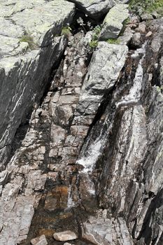 Water rocks of the beautiful Storebottåne river by the vavatn lake in Hemsedal, Buskerud, Norway.