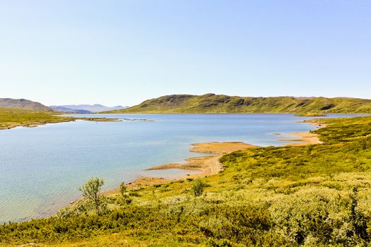 Beautiful Vavatn lake and mountains in the summertime in Hemsedal, Buskeud, Norway.