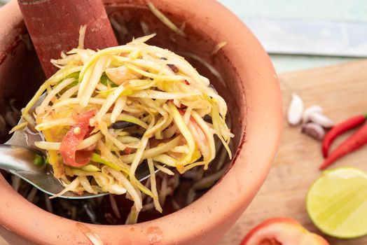 Papaya Salad with pickled crab and fish, local Thai food. street food.