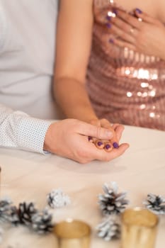 Romantic touches of a couple in love.