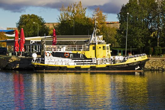 TALLINN, ESTONIA - OCTOBER 20, 2017: Boat on the water in port of Tallinn