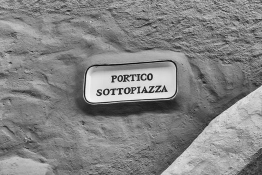 Street sign of Portico Sottopiazza, luxury shopping district in Porto Cervo, Sardinia, Italy. The town is the iconic centre of Costa Smeralda