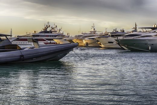 View of the harbor with luxury yachts of Porto Cervo, Sardinia, Italy. The town is a worldwide famous resort and a luxury yacht magnet and billionaires' playground