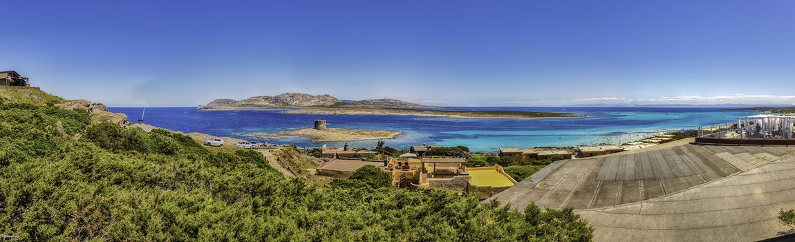 Scenic panoramic view of La Pelosa beach, one of the most beautiful seaside places of the Mediterranean, located in the town of Stintino, northern Sardinia, Italy