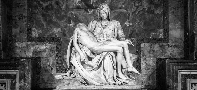 ROME, VATICAN STATE - August 28, 2018: Pietà di Michelangelo (The Pity), 1498-1499, located in St. Peter Basilica in Rome