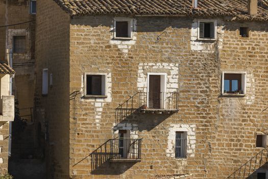 Details of the facades of stone houses in the small town of Ores, Aragon, Spain.