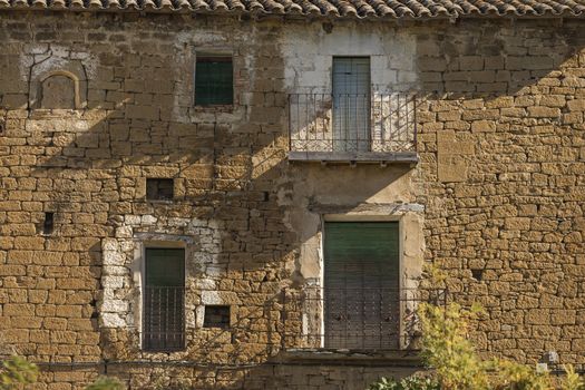 Details of the facades of stone houses in the small town of Ores, Aragon, Spain.