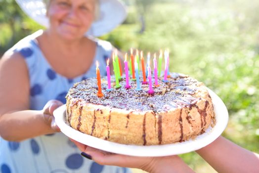 Family celebrating grandmother's birthday together. Love for mom. Happy Mothers Day. happy birthday