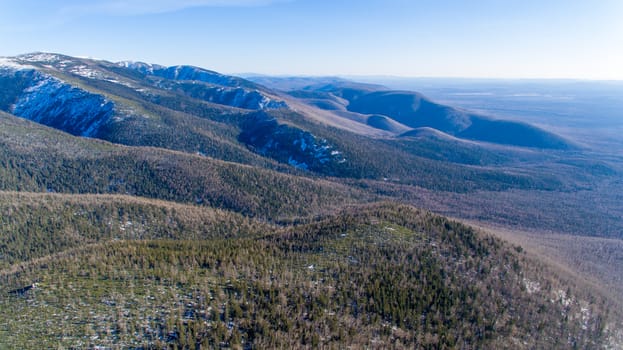 View from above. Endless green hills in the north of Russia