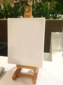 Empty convas frame on a table