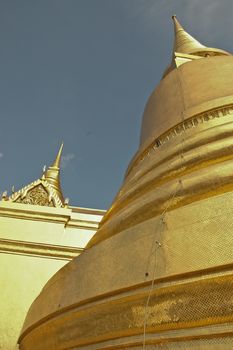 Golden stupa and blue sky in Bangkok Thailand