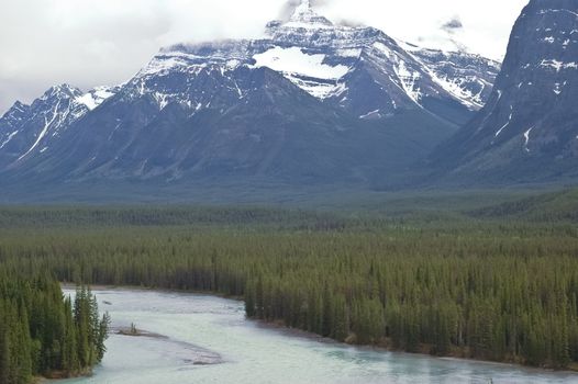 snow mountain and river