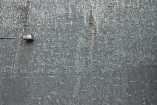 a gray rustic metallic wall