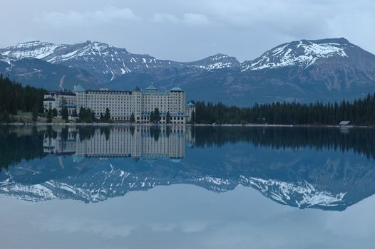 grand hotel reflection in snow mountain