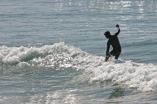 surfer on the sunny beach