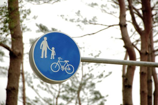 family and bicycle traffic sign in blue