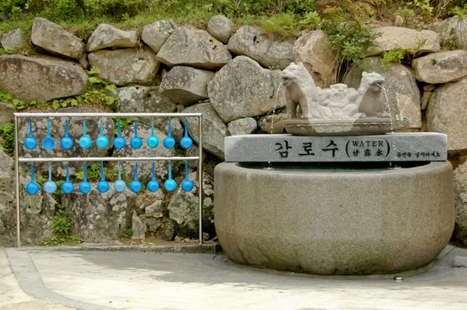 free drinking holy water ladle in Soraksan Mountain Korea