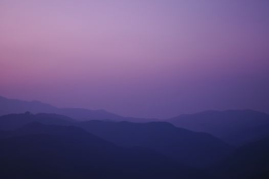 twilight sunset at the peak of the mountain