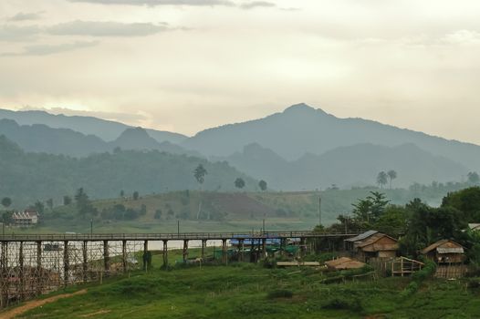 Rural fisherman village in the mid of hills in Western Thailand