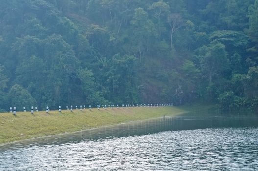 Peaceful and misty morning in national water reserve park in Northern Thailand