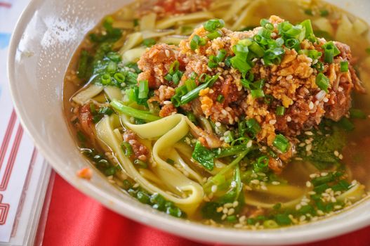 Minced meat and herbal spices noodle hot soup oriental style