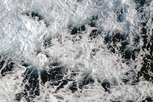 White stormy ocean wave splashing