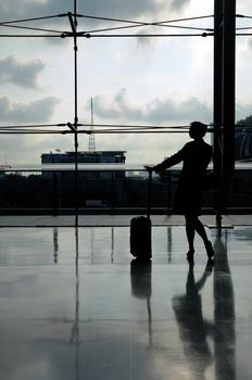 silhouette of flight attendant at the airport