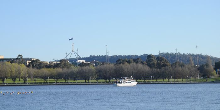 City lake and Australia parliament in Canberra