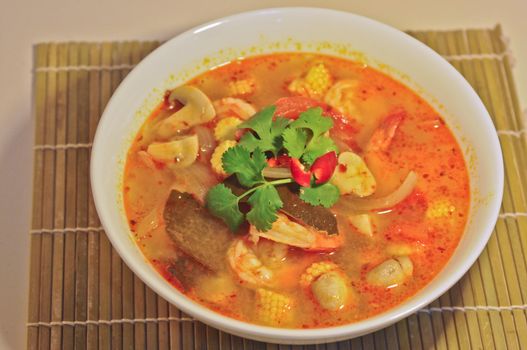 Tom Yum Kung - Hot Spicy Sour Thai herbal soup with prawn