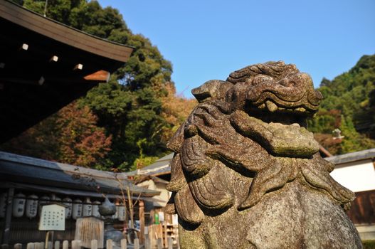 Japanese stone lion statue in old temple, Kyoto, Japan