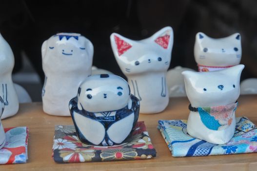 Ceramic traditional Japanese samurai pig cat kappa dolls