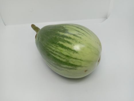 Fresh and healthy Raw Brinjal Closeup on White Background