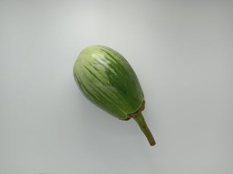 Fresh and healthy Raw Brinjal Closeup on White Background