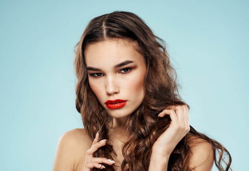 Sexy look attractive brunette woman red lips bared shoulders. High quality photo