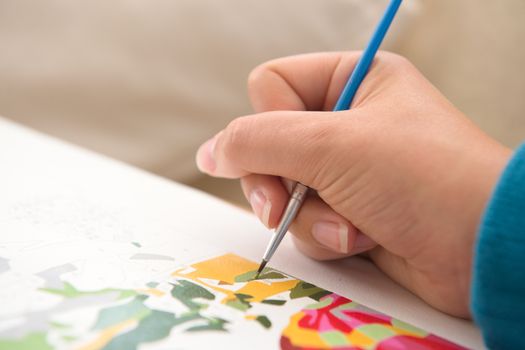 9 - Super close up of painting by numbers, bright white copy space to the left hand side. selective focus and vibrant vivid colors.