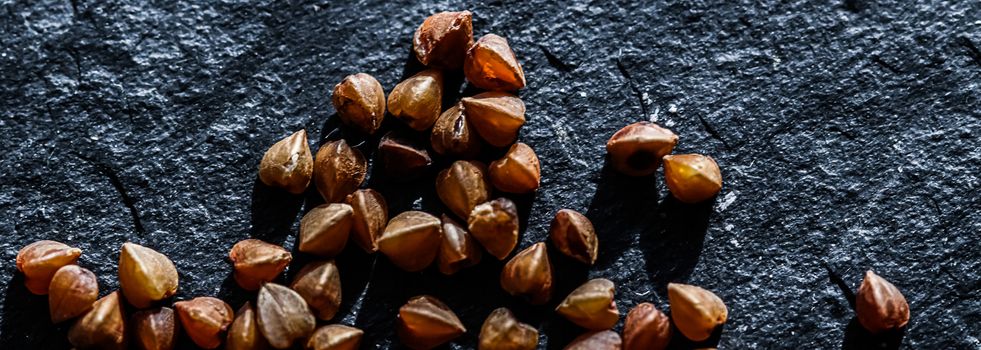 Buckwheat grain closeup, food texture and cook book backgrounds