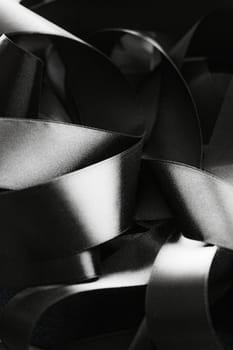 Black and white silk ribbon as background, abstract and luxury brand designs