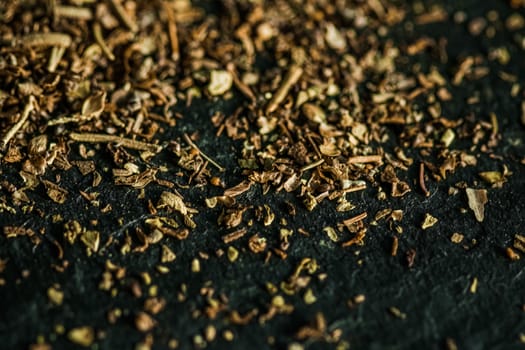 Provencal spices mix closeup on luxury stone background as flat lay, dry food spices and recipe ingredients