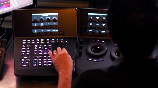 Telecine controller machine for editing or adjusting color on digital video movie or film in the post production stage. 