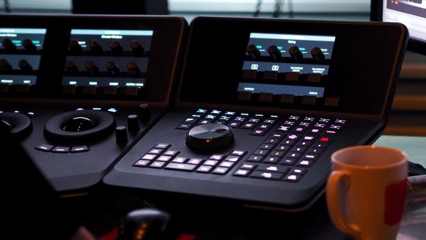 Telecine controller machine for editing or adjusting color on digital video movie or film in the post production stage. 