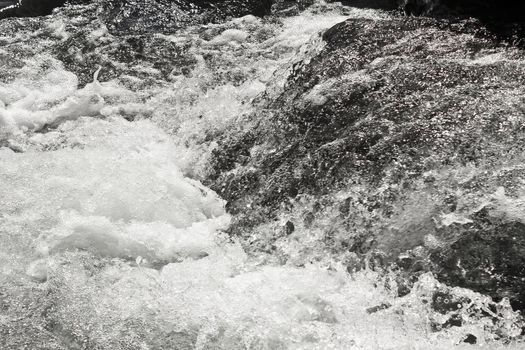 Fast flowing Storebottåne river water of the Vavatn lake in Hemsedal, Buskerud, Norway.